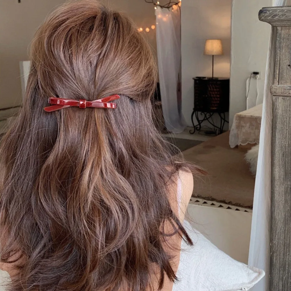 Accessoire cheveux rouge style noeud papillon